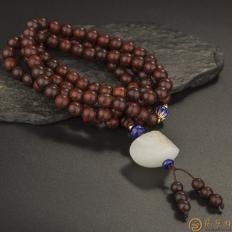 新疆和田玉黄皮一级白玉籽玉配小叶紫檀手链 饕餮 48克