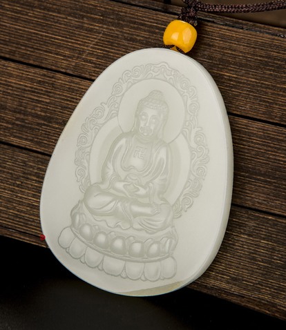 新疆和田玉黄皮白玉籽玉玉牌 大日如来 43克